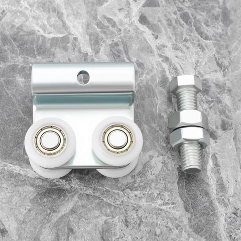 Two Pack Stainless Steel Nylon Sliding Track Roller Kit With Bolts And Nuts for Barn Doors shown on marble surface