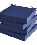 Stack of 4 navy cushions, Outdoor Chair Cushions Set Of 4 Waterproof 19X19X3 Inches With Handles And Ties Navy Blue For Patio Furniture.