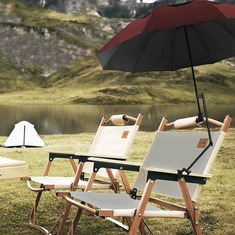 Portable Patio Umbrella With Solid Clamp Mount For Beach Chairs And Golf Carts, No Fuss Manual Open Close, Heavy Duty Sunshade Delivers Top Shelf UV Block And Swift 360 Swivel Base For Laidback Outdoor Chill Days (43 Inch Wine) mounted on a beach chair by a serene lake.