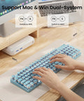 Top Shelf Retro Typewriter Mechanical Keyboard With Hella Crisp Blue Switches And Long Lasting Rechargeable Battery For Slick Triple Mode Gaming Setup Compatible On Windows Mac Pc Devices, hands typing on blue keys.