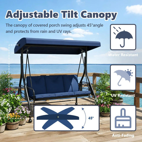 Three Seat Outdoor Porch Swing Glider With Adjustable Canopy Convertible Patio Bed Upgraded Folding Cup Holders Thick Cushions Cozy Up In The Backyard Garden Poolside Blue on a wooden patio by the sea with greenery and icons showcasing features like UV resistance and anti-fading.
