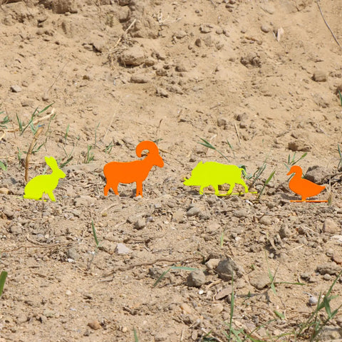 Range Ready Neon Color Steel Animal Silhouette Targets 4 Pack High Visibility Knockovers in outdoor setting
