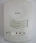 Front view of a 12 24V 4 Wire System Monitored Carbon Monoxide Detector With RealTest Technology, white plastic housing, UL 2075 compliant.