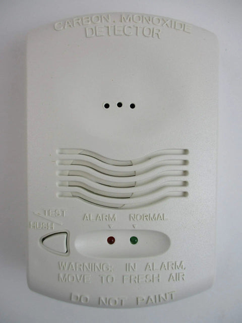 Front view of a 12 24V 4 Wire System Monitored Carbon Monoxide Detector With RealTest Technology, white plastic housing, UL 2075 compliant.