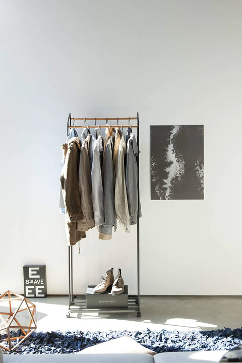 Kickass Rolling Wardrobe Rack With Staggered Wooden Bars And Roomy Bottom Shelf Built Tough With Steel Frames Delivers The Ultimate Flex For Portable Closet Setup Anywhere Glides On Smooth Casters