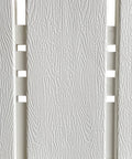 Close-up of wood texture on white Landscape Edging Kit With 6.7 Inch Tall Wood Look Border For Flower Beds And Gardens.