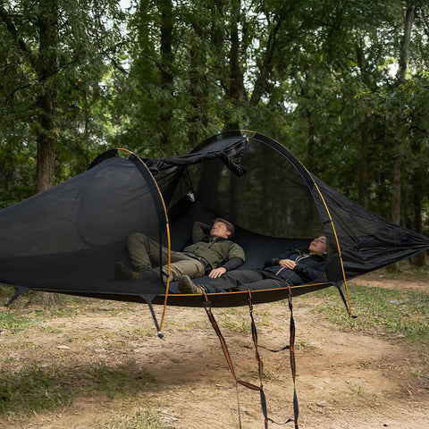 Two people relaxing in a Two Person Triangle Hammock Tent For Easy Lay Flat Comfort With Three Point Setup Including Bug Net And Rainfly