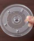 Two Pack 4 Inch Clear Acrylic Lazy Susan Turntable Set With Ball Bearing 360 Degree Rotation, hand holding clear spinning tray