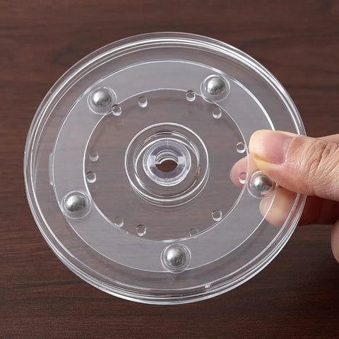 Two Pack 4 Inch Clear Acrylic Lazy Susan Turntable Set With Ball Bearing 360 Degree Rotation, hand holding clear spinning tray
