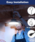 Man installing Ultra Bright 160W UFO LED High Bay Light For Warehouse Garage And Workshop, 24000 Lumen 5000K Daylight Color