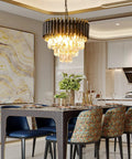 Modern Crystal Chandelier 3 Tier Round Black And Gold Pendant Light With 12 LED Bulbs over dining table in elegant room