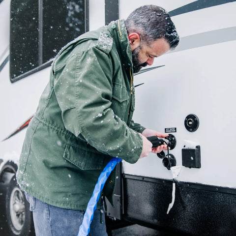 Man connecting Heated Water Hose For RV Beefed Up 50 Feet Freeze Protection To Minus Twenty Degrees Drinking Water Safe And Lead Free