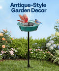 Solar Powered Bird Bath Fountain For Outdoors With Weather Resistant ABS Bowl And Ground Stake Includes 4 Detachable Support Rods For Stable Fountain No Splash Setup Garden Bird Bath One Point Four Five Gallons Green on grass with flowers and birds