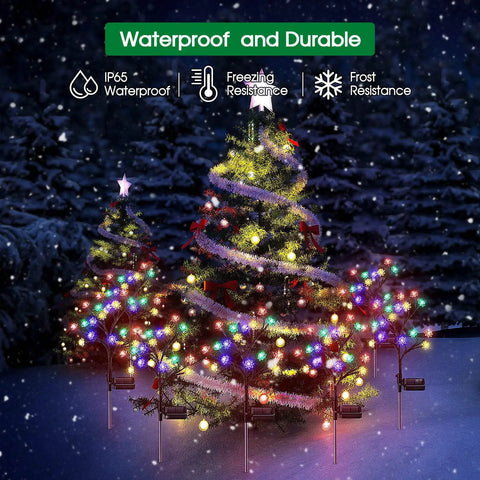 4 Pack Upgraded Solar Flower Lights For Garden Waterproof Outdoor Cherry Blossom LED Lights illuminating snowy garden scene.