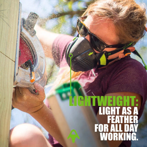 Woman using circular saw wearing N100 Dust Mask Respirator With Twin Replaceable Filters For 99.99 Percent Particle Filtration In Real World Use