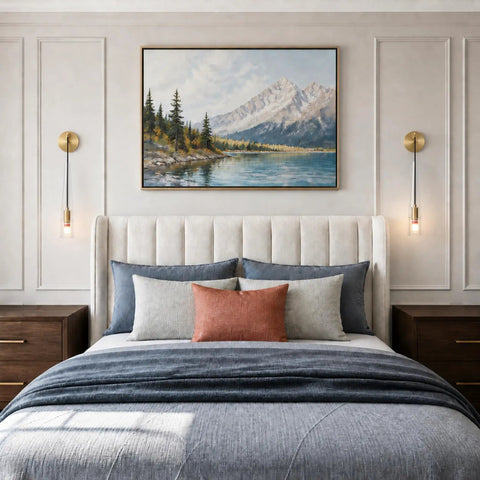 XYDikssn Crystal Wall Sconces, Brushed Gold Brass Wall Lights with Clear Crystal Glass, Hardwired Hanging Wall Lamps mounted beside a bed with decorative pillows.
