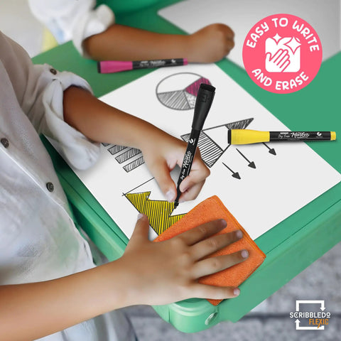 Child using Flexible 11x14 Dry Erase Sheets For Math Practice With Quad Graph Whiteboard Sheets Classroom Pack Of 10, drawing on a table.