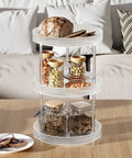 3 Tier Lazy Susan Bathroom Countertop Organizer With 360 Degree Rotating Clear Tray holding jars and bread