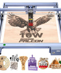 Creality Falcon 10W laser engraver with blue frame and 15.7 x 16.3 in work area engraving a wood panel with an eagle
