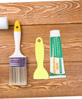 Drywall Repair Putty Paste For Quick Hole Patching And Wall Mending Cream tube with brush and spatula on wood surface