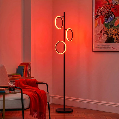 RGB Color Changing Floor Lamp With Tall Tree Design in matte black, glowing in orange-red, 3 LED lights for modern living room ambience.