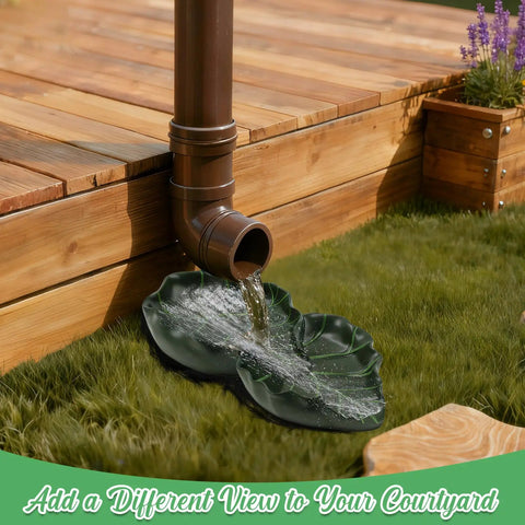 Dual Leaf Decorative Splash Block And Gutter Downspout Rain Diverter Extension For Lawn Patio Yard Garden Heavy Duty Weatherproof No Hassle Backyard Kickback To Shield Foundation Smooth Water Flow, brown downspout directing water onto green leaf-shaped splash block.