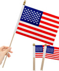 12 Pcs 8x12 Inch American Flags On Wooden Sticks 17.5 Inch Tall Outdoor Handheld Flags Dual Sided Vivid Polyester For Veterans Day Memorial Day Fourth Of July Independence Day Parties And Patriotic Decor visible in hand and grouped stack