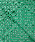 Interlocking Rubber Floor Tiles Eleven Point Six Inch Cushioned Mats With Drain Holes Non Slip Waterproof Green Surface Close-up