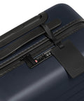 Close-up of Bigger Carry On Luggage From Away, showing TSA lock and durable navy polycarbonate shell.