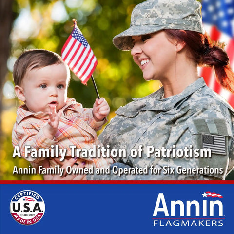 Military woman and child holding flag with text "A Family Tradition of Patriotism" by Annin Flagmakers, USA made.