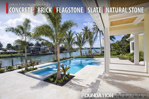 Tough As Nails Silane Siloxane Concrete Sealer 5 Gallon on poolside with plants and palm trees near water.