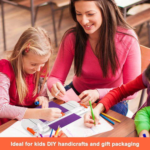 Children and woman using 27 Piece Craft Weeding Tools Kit For Vinyl With Utility Knife Set And 12 Inch Paper Cutter Trimmer for crafts