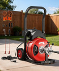 Heavy Duty 100 Foot Electric Drain Snake Packed With A Tough As Nails Steel Core Cable and Hassle Free Auto Feed, with accessories.