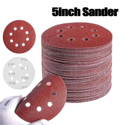 Grab These Badass 5 Inch Sanding Discs With Hook Loop Back For Random Orbital Sanders featuring stacked red discs with 8 holes.