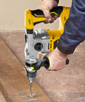 SDS Plus Rotary Hammer Drill 1500W Workhorse With 6 Joules Impact drilling into concrete with chisel and drill bit attachment