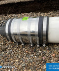 2 Inch XL Flexible Pipe Coupling Connector With Stainless Shield for underground pipes, gravel background, close-up view.