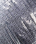 Geometric pattern with crisscross lines creating abstract architectural look in grayscale