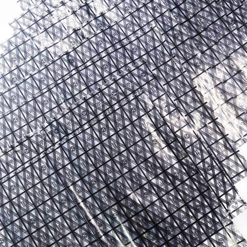 Geometric pattern with crisscross lines creating abstract architectural look in grayscale