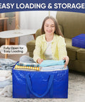 Woman packing clothes into Six Pack Extra Large Moving Bags Heavy Duty With Zippers And Carrying Handles for moving and storage.