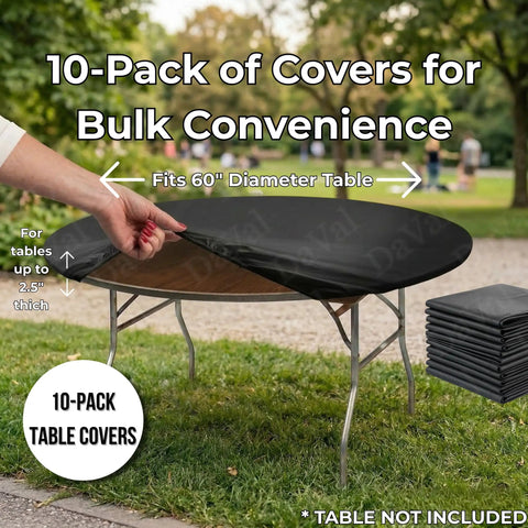 Person fitting a black plastic table cover on a 60-inch round table outdoors, stack of Ten Pack Black Round Plastic Table Covers For 60 Inch Tables Indoor Outdoor Fitted Covers 5 Feet Diameter Tables Not Included Bulk Party Catering Supply For Events Or Receptions visible