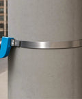 Band-It CP1899 center punch clamp around galvanized carbon steel post; 5/8 in wide strap, 0.025 in thick, 4.5 in diameter.