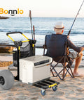 Foldable 2 In 1 Beach Wagon Cart With 12 Inch Balloon Wheels For Sand beside fishing man on beach
