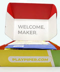 Hands-On Kids Computer Kit For STEAM Learning With Raspberry Pi, Drag-And-Drop Coding, Story Mode, Python Projects, Interactive Games, And Real World Tech Skills open box with welcome insert