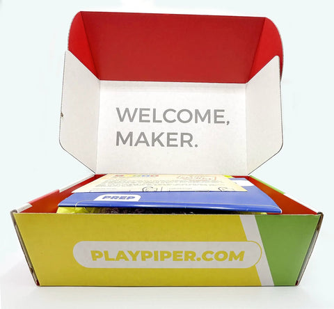 Hands-On Kids Computer Kit For STEAM Learning With Raspberry Pi, Drag-And-Drop Coding, Story Mode, Python Projects, Interactive Games, And Real World Tech Skills open box with welcome insert