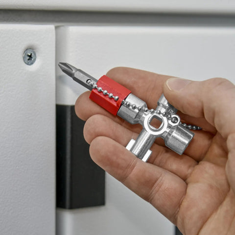 All-in-One Universal Control Cabinet Key for Gas, Water and Electric Shutoffs, hand holding key near cabinet lock