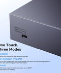 Close-up of metal network hub showing switch for VLAN, extend modes, part of 10 Port PoE Switch With 8 PoE Plus Ports Up To 60W Budget.