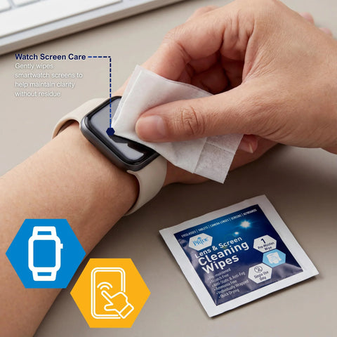 Close-up of a hand wiping a smartwatch screen with a premoistened lens and screen cleaning wipe; wipe packet nearby.
