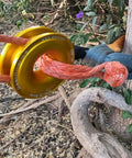 G.O.L.D. Snatch Recovery Ring for Off Road Recovery, 48,000 Lbs MBS, 24,000 Lbs WLL in use with orange synthetic shackle outdoors
