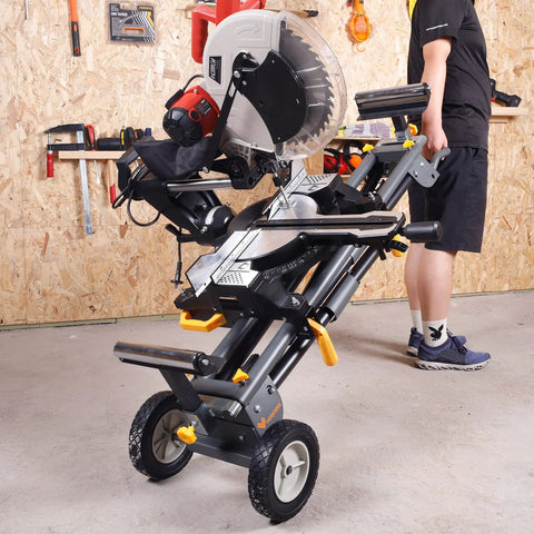 Lightweight Universal Miter Saw Stand With 330 Lb Capacity, A Real Workhorse, with saw mounted, in workshop setting.