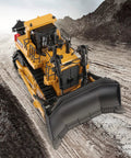 One Fifty Scale Diecast Metal Dozer Toy With Tilt Blade And Working Tracks on dirt road